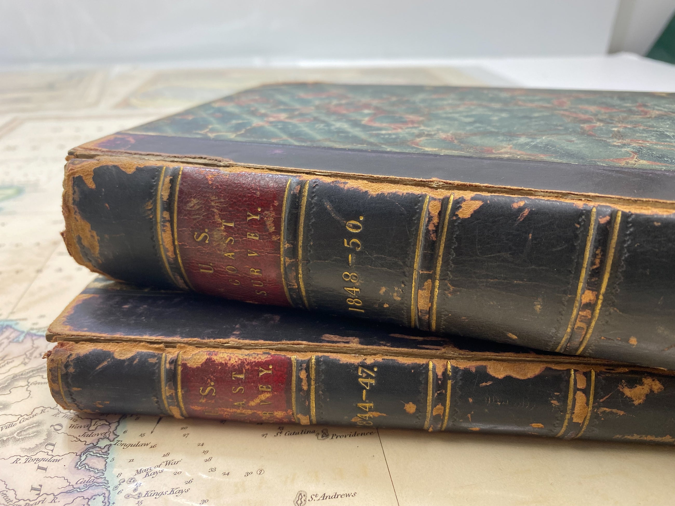 Antique Books and Reports with Maps and Charts, and Old World Maps